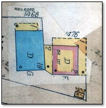 This map from 1945 shows the Sherry House (blue) and the Depot Saloon (red) with the middle structure joining the two. Blue denotes a stone structure and red denotes a wooden structure.